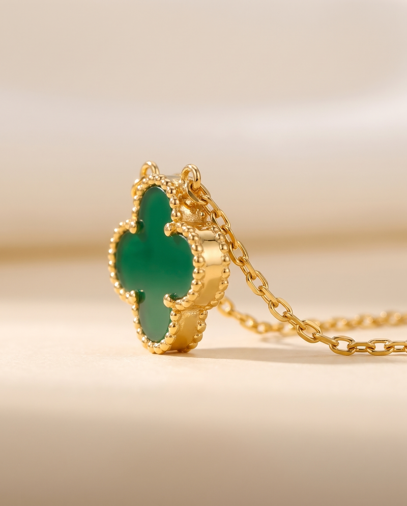 The Clover Necklace in green, close view of the pendant