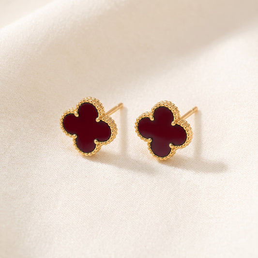 The Clover Studs in red on ivory linen