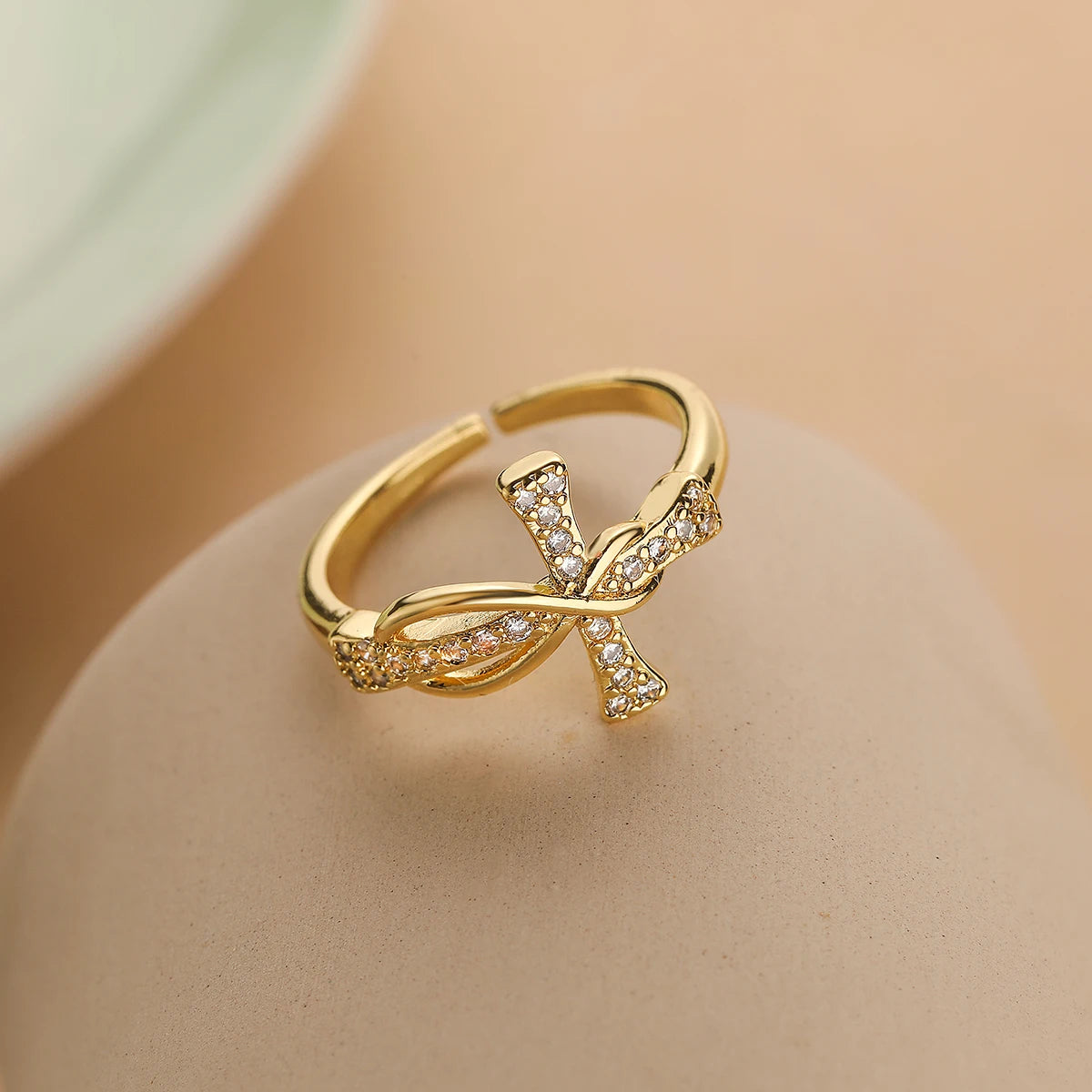 Infinity Cross Ring — product and styling view 2