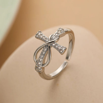 Infinity Cross Ring — product and styling view 3