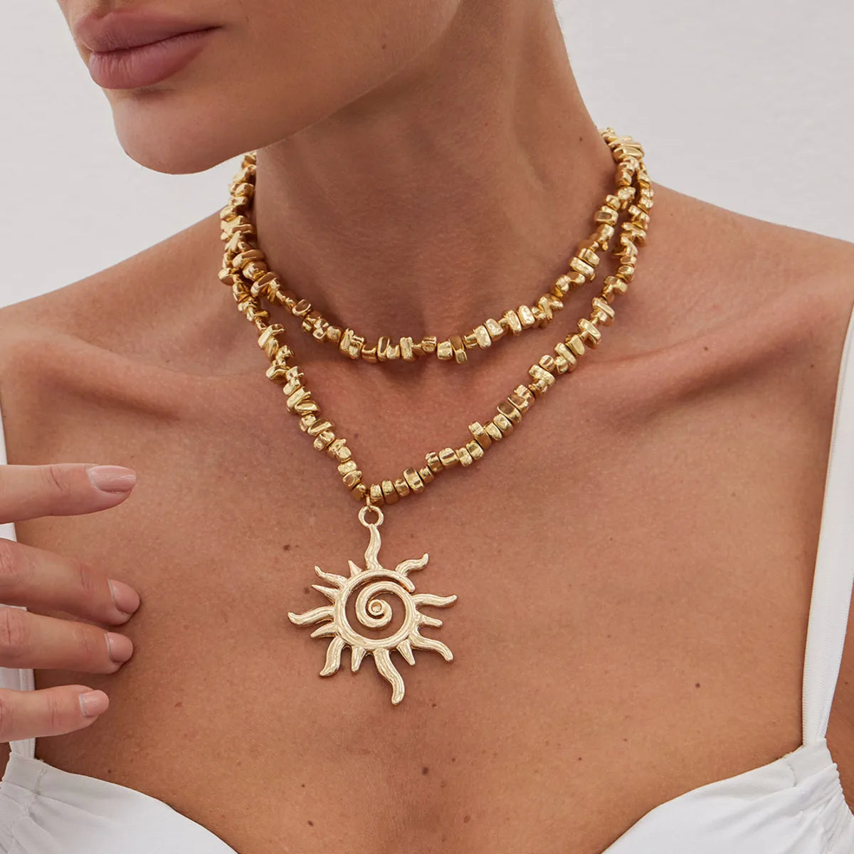 Spiral Sun Necklace Duo — product and styling view 1