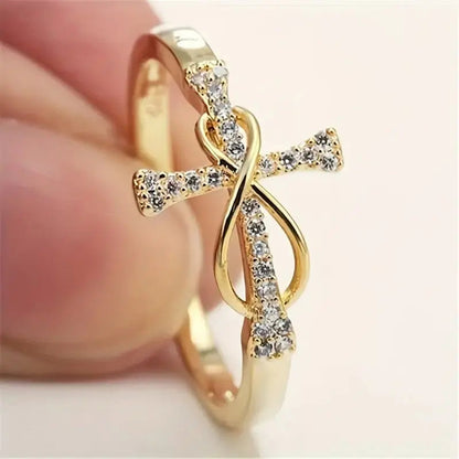 Infinity Cross Ring — product and styling view 7