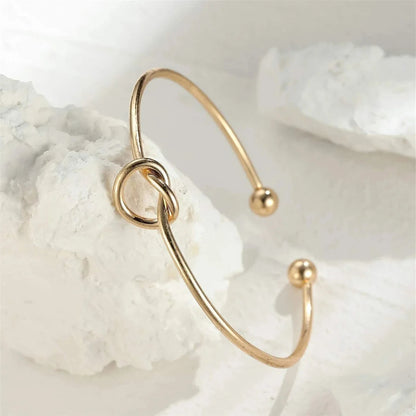 Connection Knot Cuff — product and styling view 4
