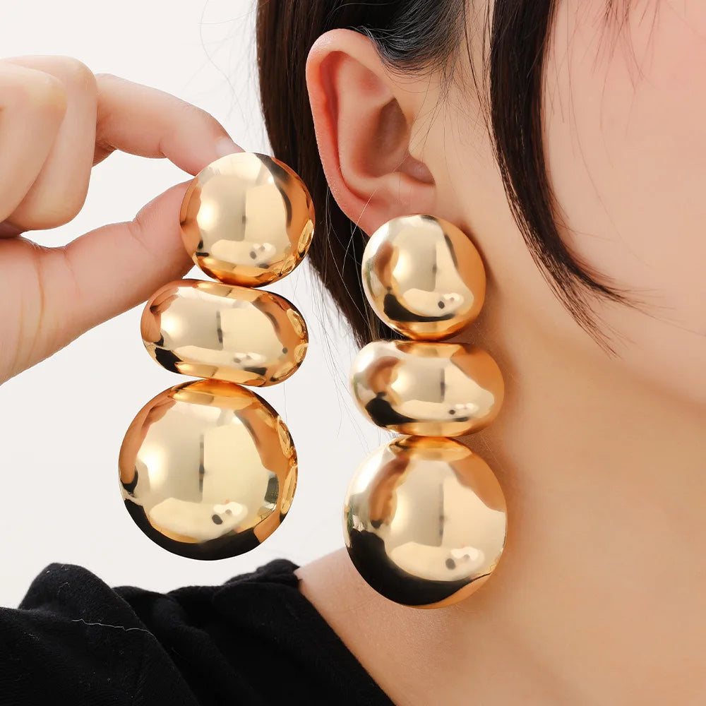 Sculpted Sphere Earrings — product and styling view 3