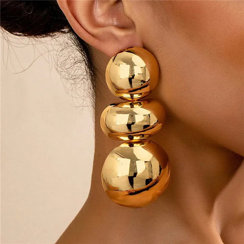 Sculpted Sphere Earrings — product and styling view 1