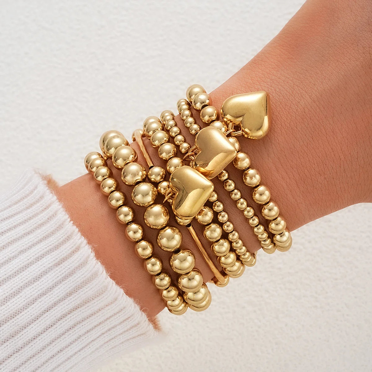 Beaded Heart Charm Bracelet Stack — product and styling view 1