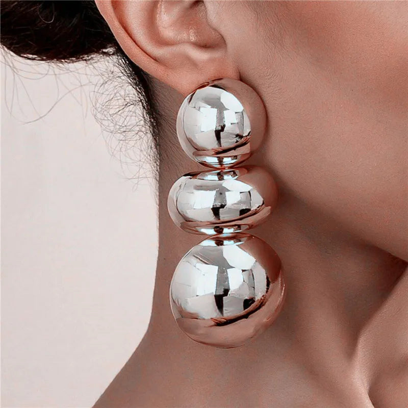 Sculpted Sphere Earrings — product and styling view 2