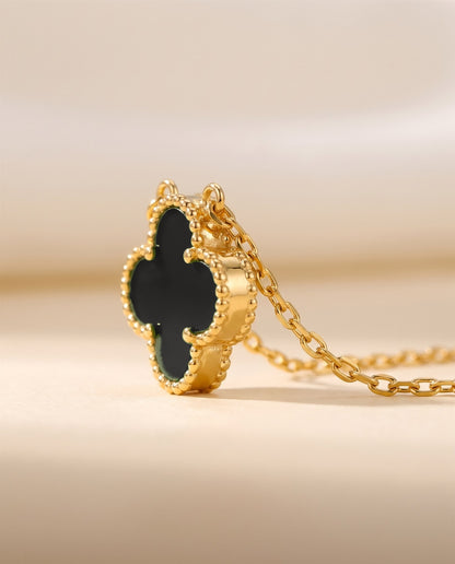 The Clover Necklace in black, close view of the pendant